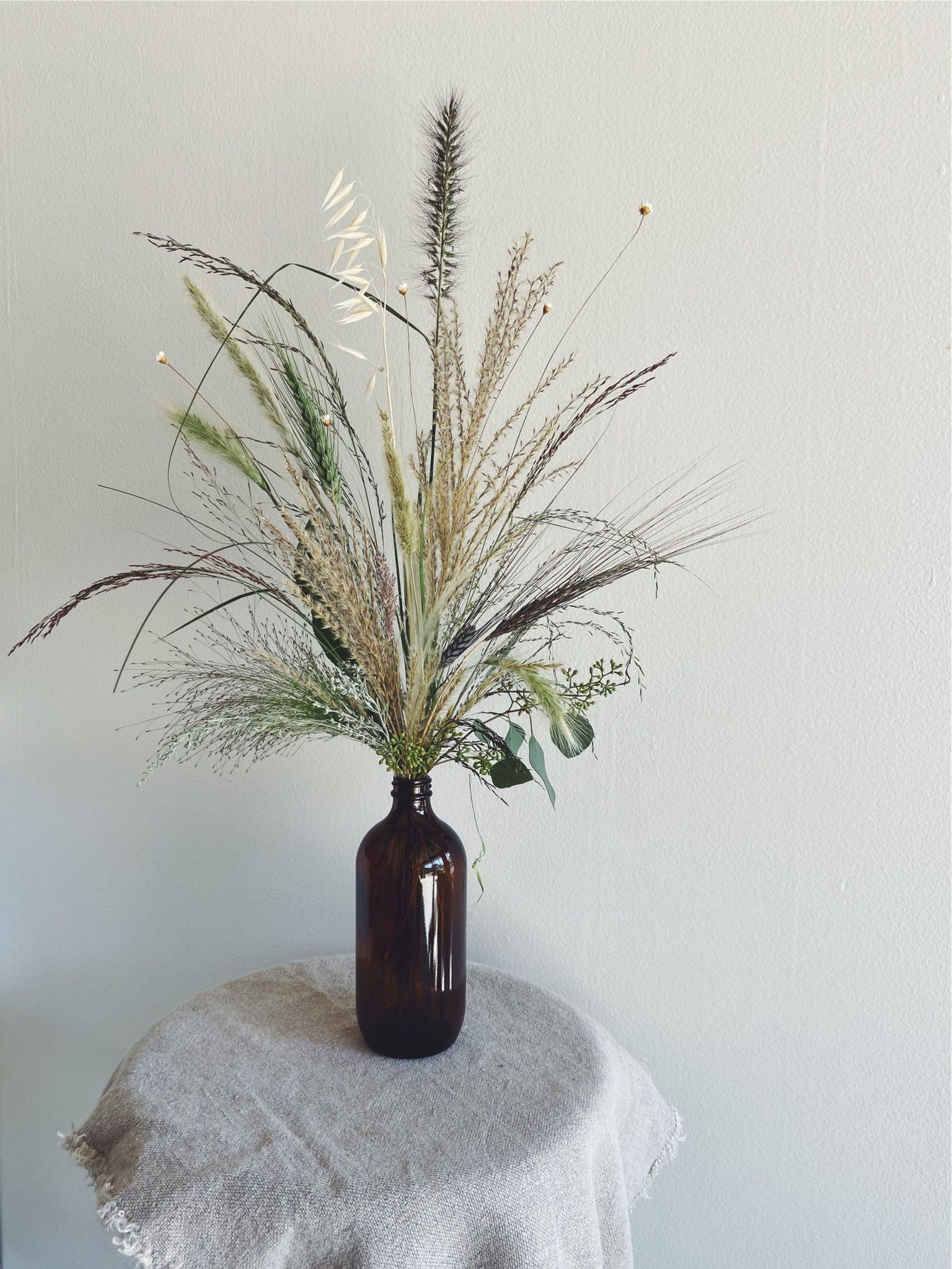 Arrangements - The Dried Bottle Arrangement - The Wild Bunch Florals - The Wild Bunch Florist - Vancouver Flower Shop Delivery